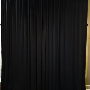 Black curtain used as a black backdrop for events and photography.