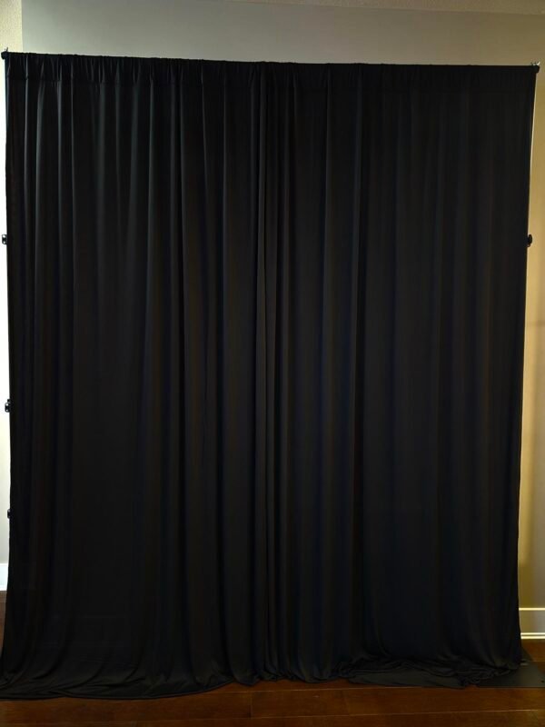 Black curtain used as a black backdrop for events and photography.