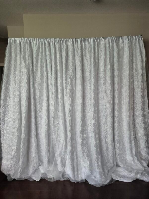 White curtain used as a white backdrop for events and photography.