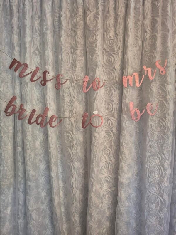 Bridal shower backdrop decorated for elegant celebrations.