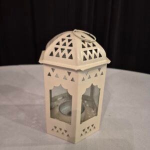 Decorative lantern light with tea light inside for events.