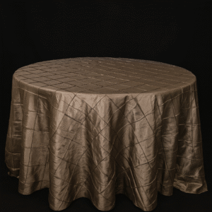 Copper pintuck round tablecloth on an event table.