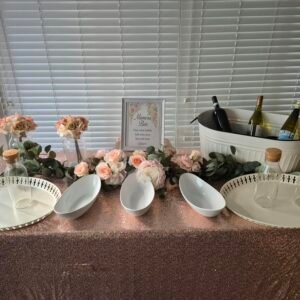 Pretty in Pink Mimosa Bar Table setup for parties and events.