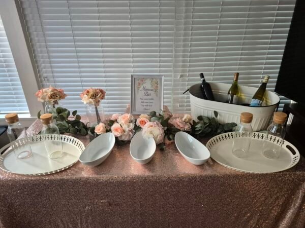 Pretty in Pink Mimosa Bar Table setup for parties and events.
