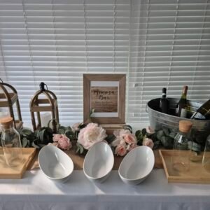 Rustic bar table with Rustic Elegance and Floral Flair Mimosa Bar Table setup.