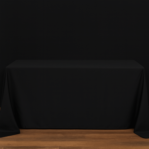 Black rectangle tablecloth covering an event table.