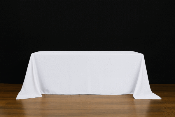 White rectangle tablecloth on an event table.