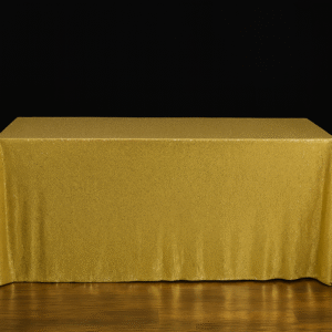 Gold sequin rectangle tablecloth on an event table.
