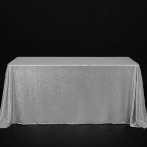 Silver sequin rectangle tablecloth on an event table.