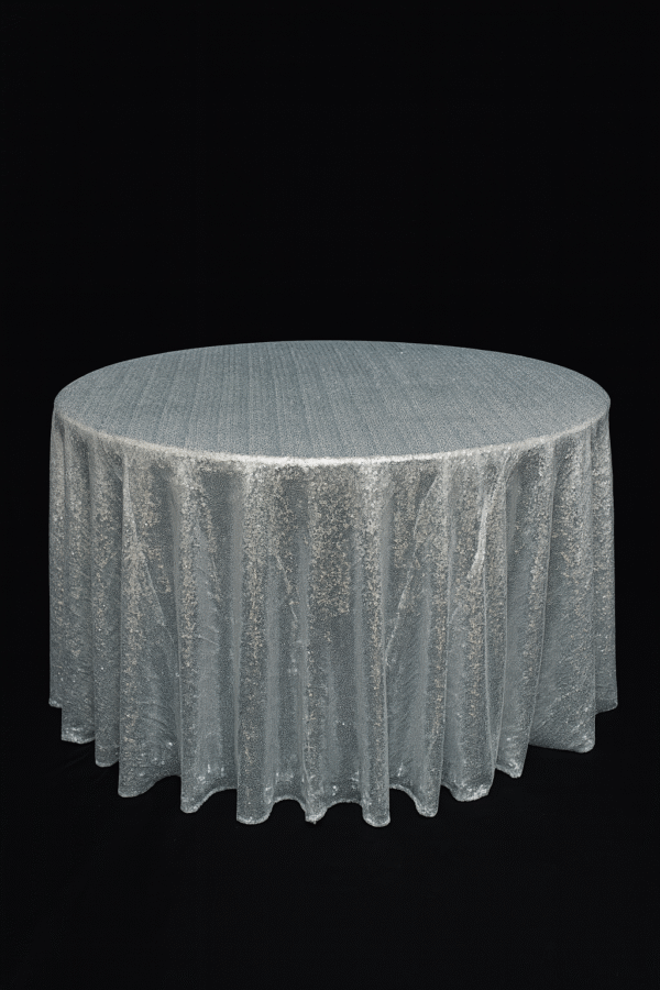 Silver sequin round tablecloth on an event table.